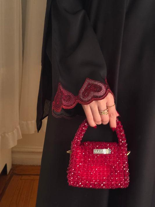 Qalb (closed) Abaya with hijab.